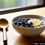 정신적 피로 회복을 위한 식사 아이디어 - A bright and inviting breakfast scene featuring a bowl of creamy oatmeal topped with fresh blueberri...